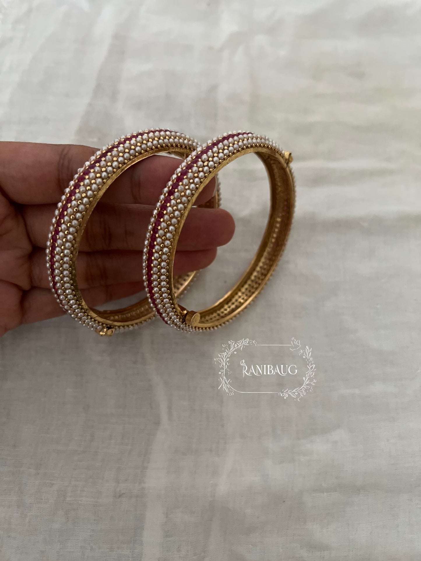 Vandita Moti Pearl Studded Gold Finish Designer Heritage Bangle Pair By Ranibaug