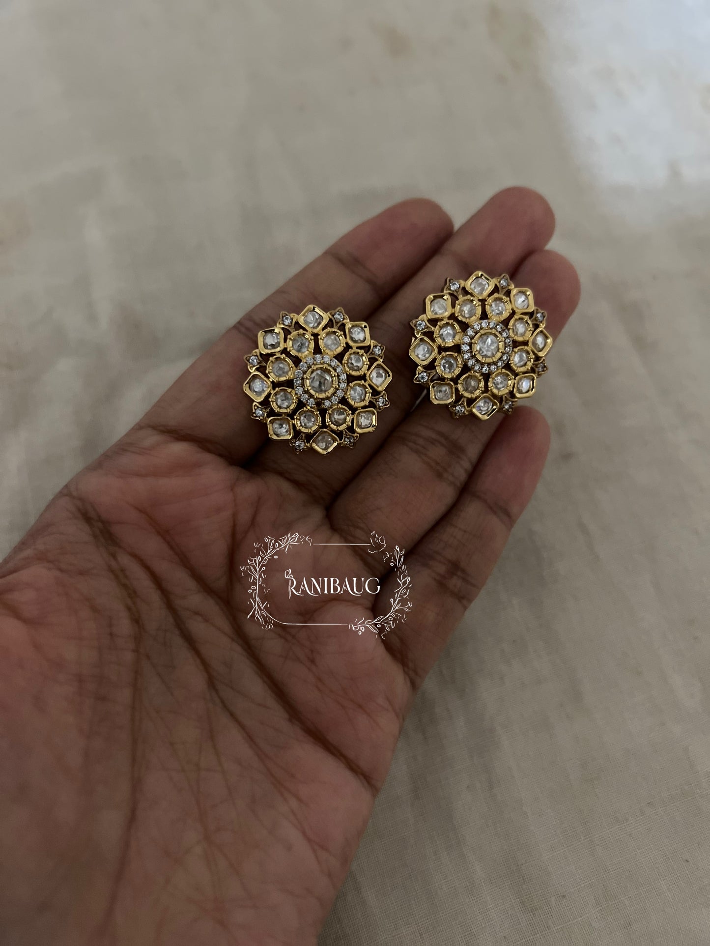 Vanya Marigold Gold Finish Kundan Studded Oversized Stud Earrings By Ranibaug