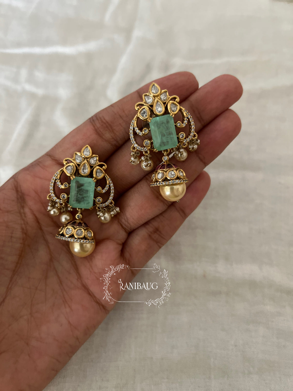 Varenya Polki Emerald Festive Stud Earrings By Ranibaug