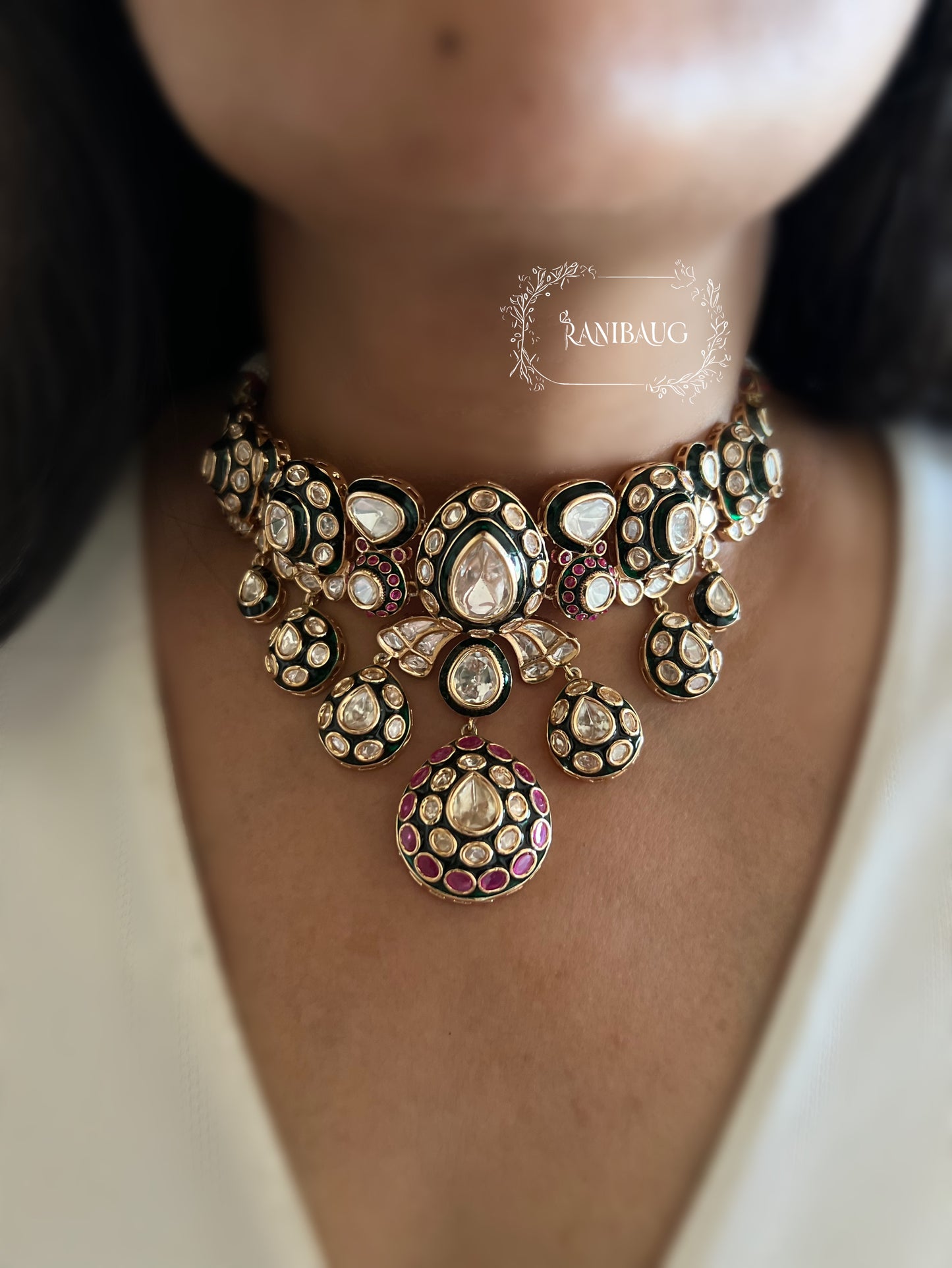 Varnisa Polki Adorned Rich Emerald And Ruby Hues Festive Choker Necklace Set By Ranibaug