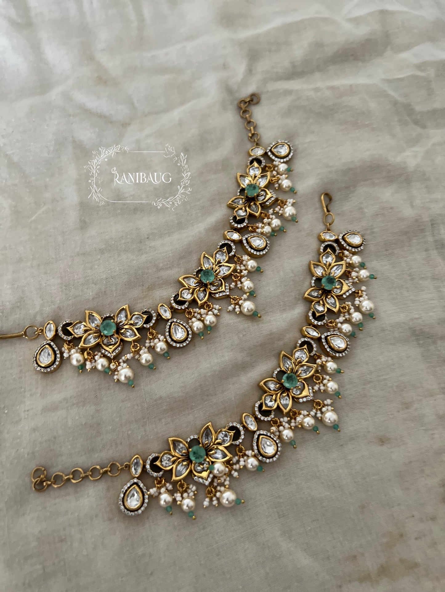 Vartika Gold Finish Polki Studded Pearl Adorned Floral Motif Designer Hairchain Jewelry By Ranibaug
