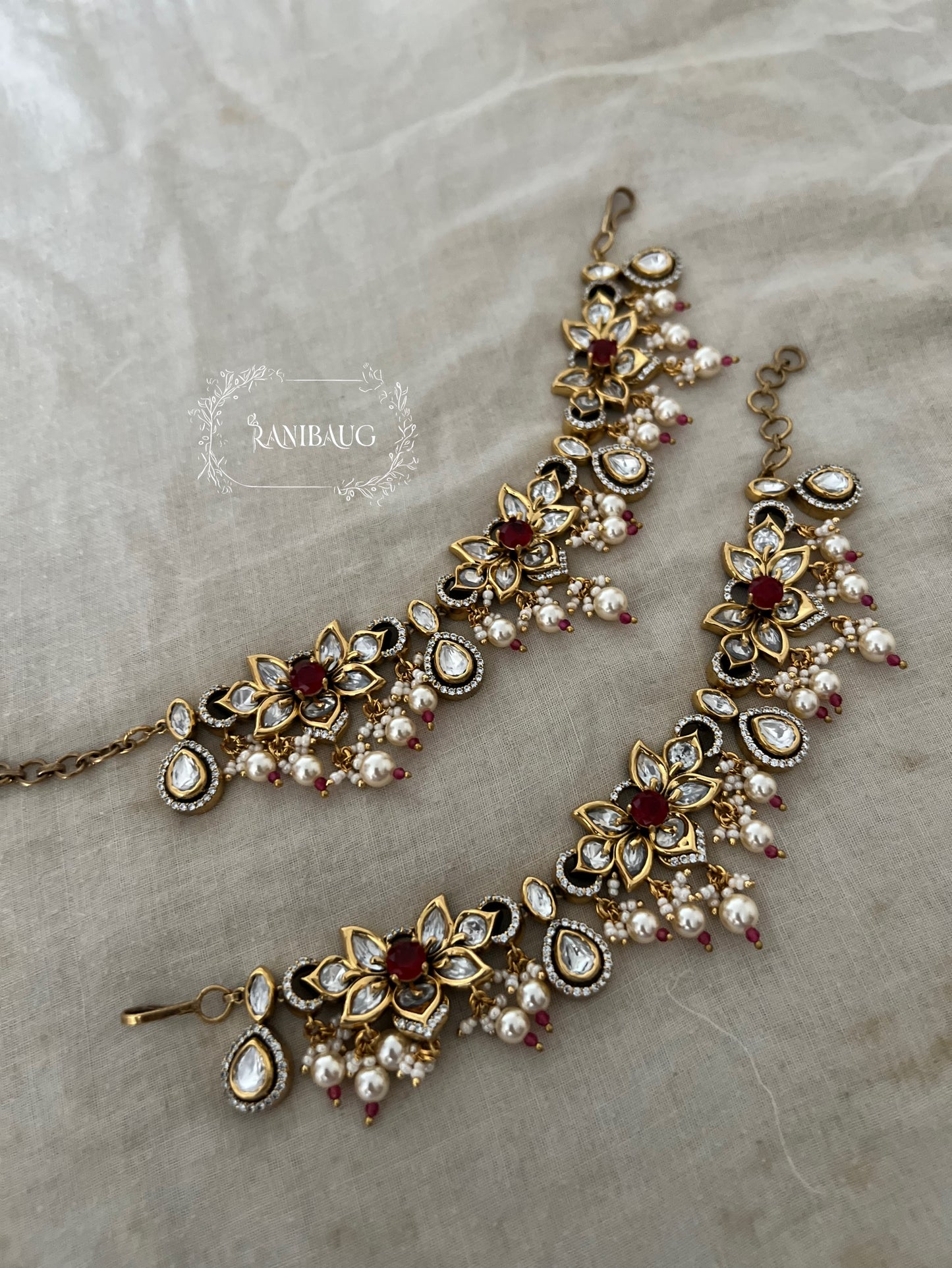 Vartika Gold Finish Polki Studded Pearl Adorned Floral Motif Designer Hairchain Jewelry By Ranibaug