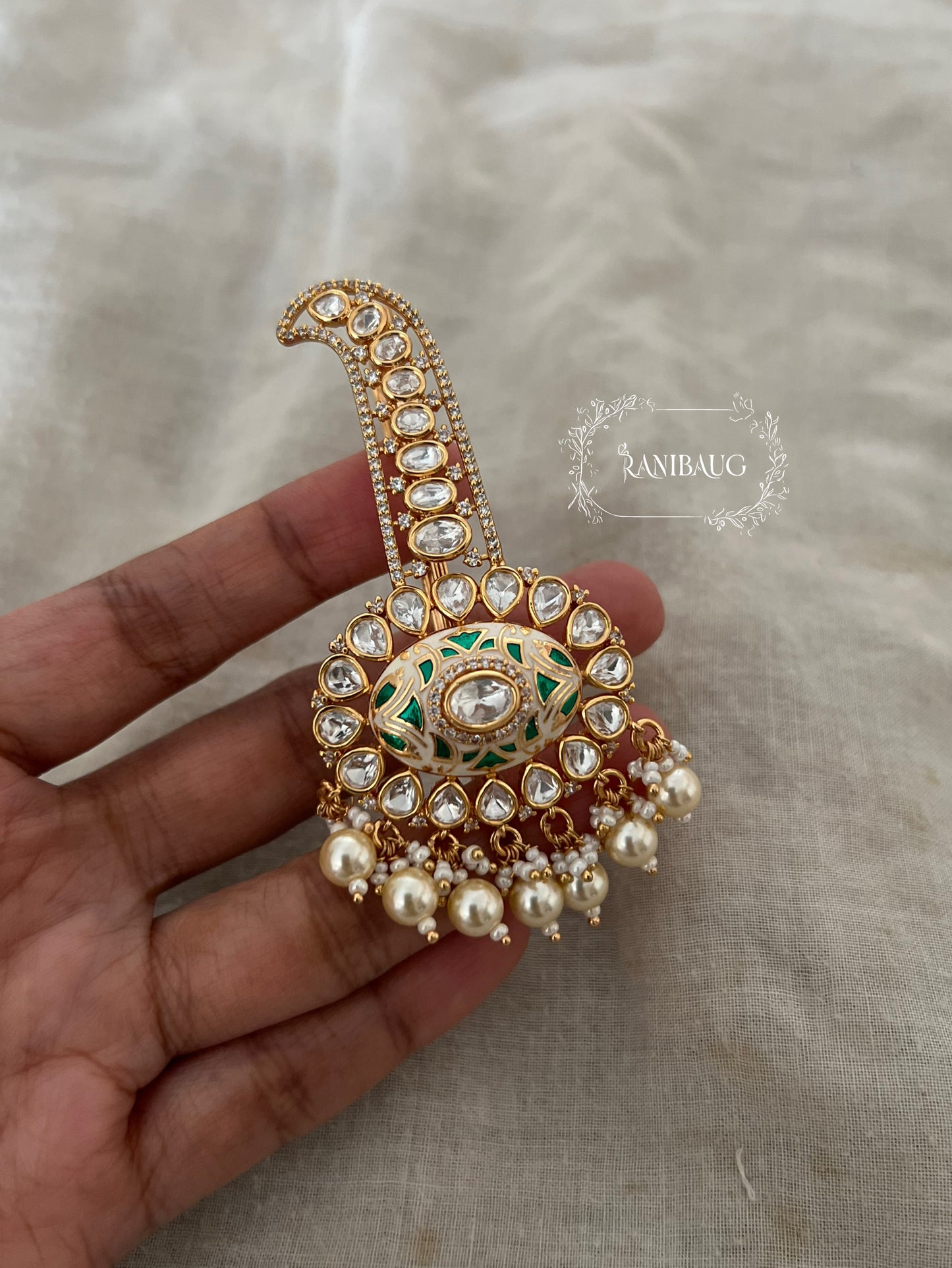 Varun Meenakari Polki Studded Rich Gold Finish Kalgi Broch Jewellery Adorned With Creamy Pearls By Ranibaug