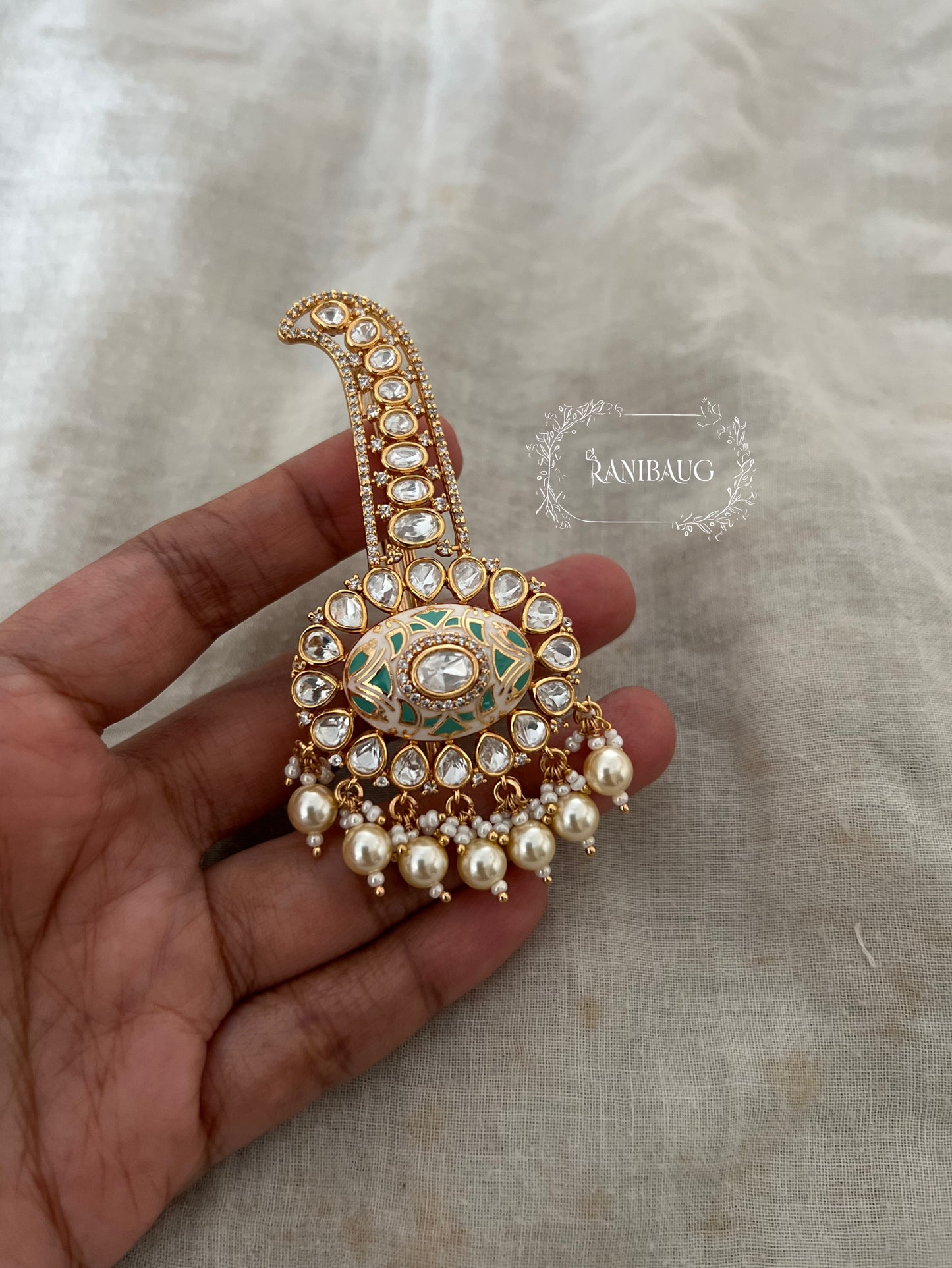 Varun Meenakari Polki Studded Rich Gold Finish Kalgi Broch Jewellery Adorned With Creamy Pearls By Ranibaug