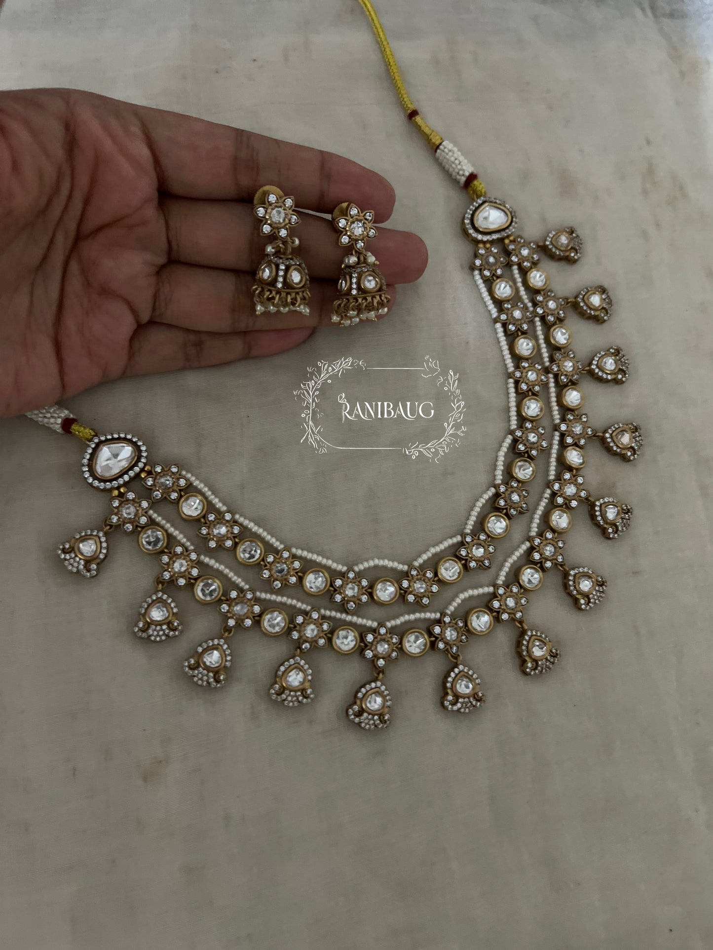 Vasudha Layered Polki Vintage Style Flower Motif Pearl Adorned Jewellery Set By Ranibaug