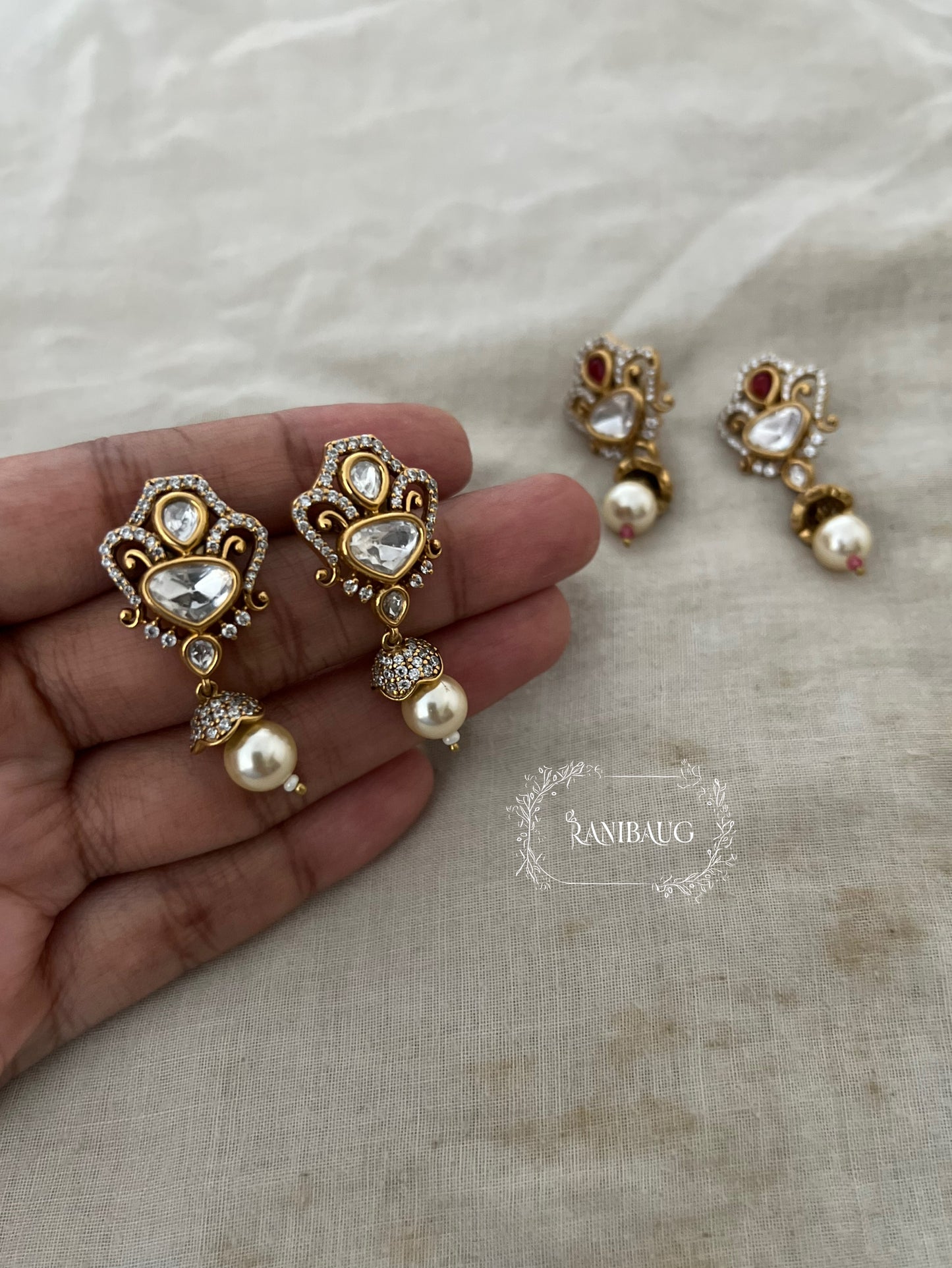 Vishana Floral Crown Polki Kundan Pearl Dangle Gold Finish Ear Studs By Ranibaug