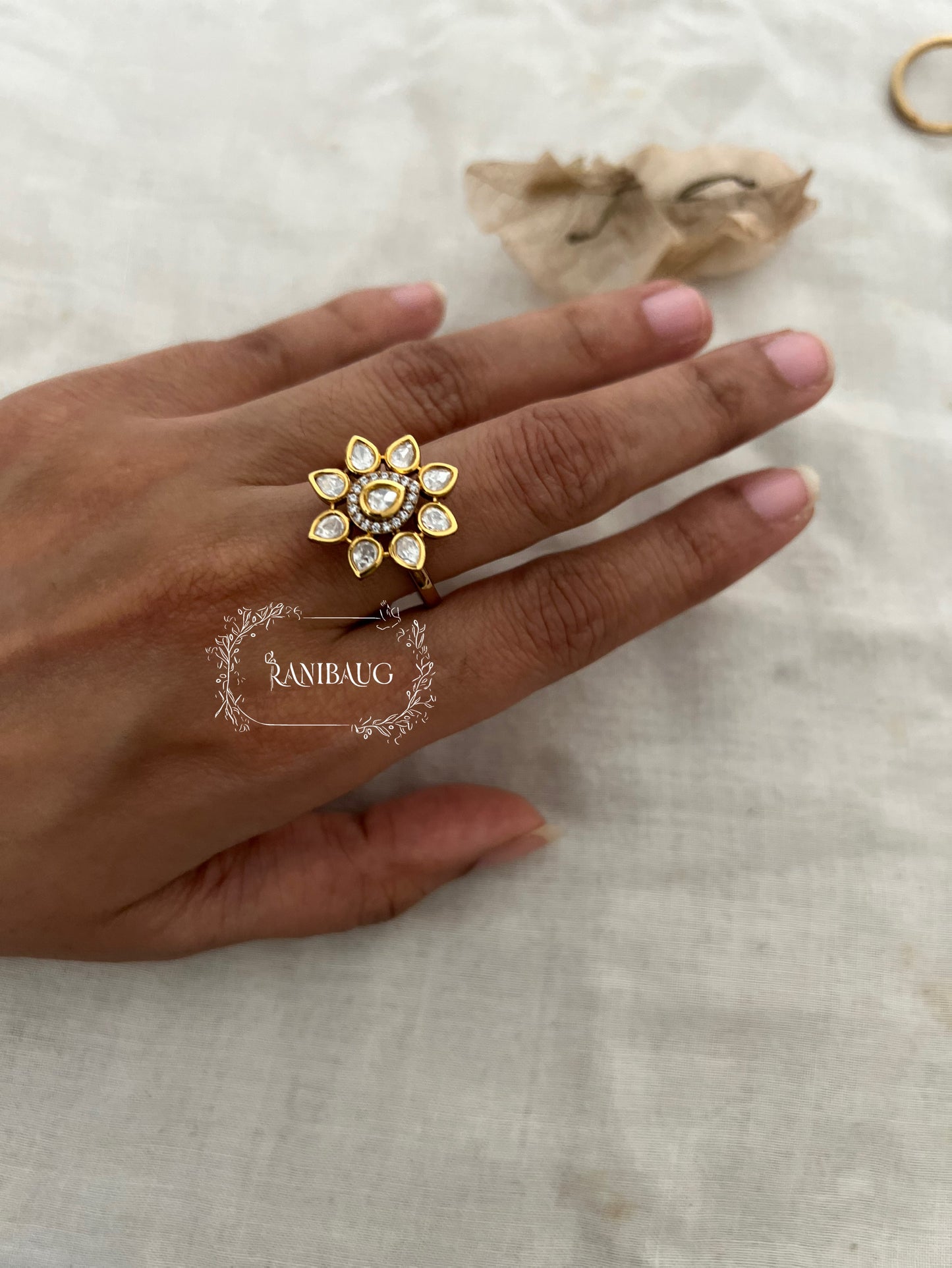 Vismita Minimalistic Flower Kundan Rings In Artificial Gold Finish By Ranibaug