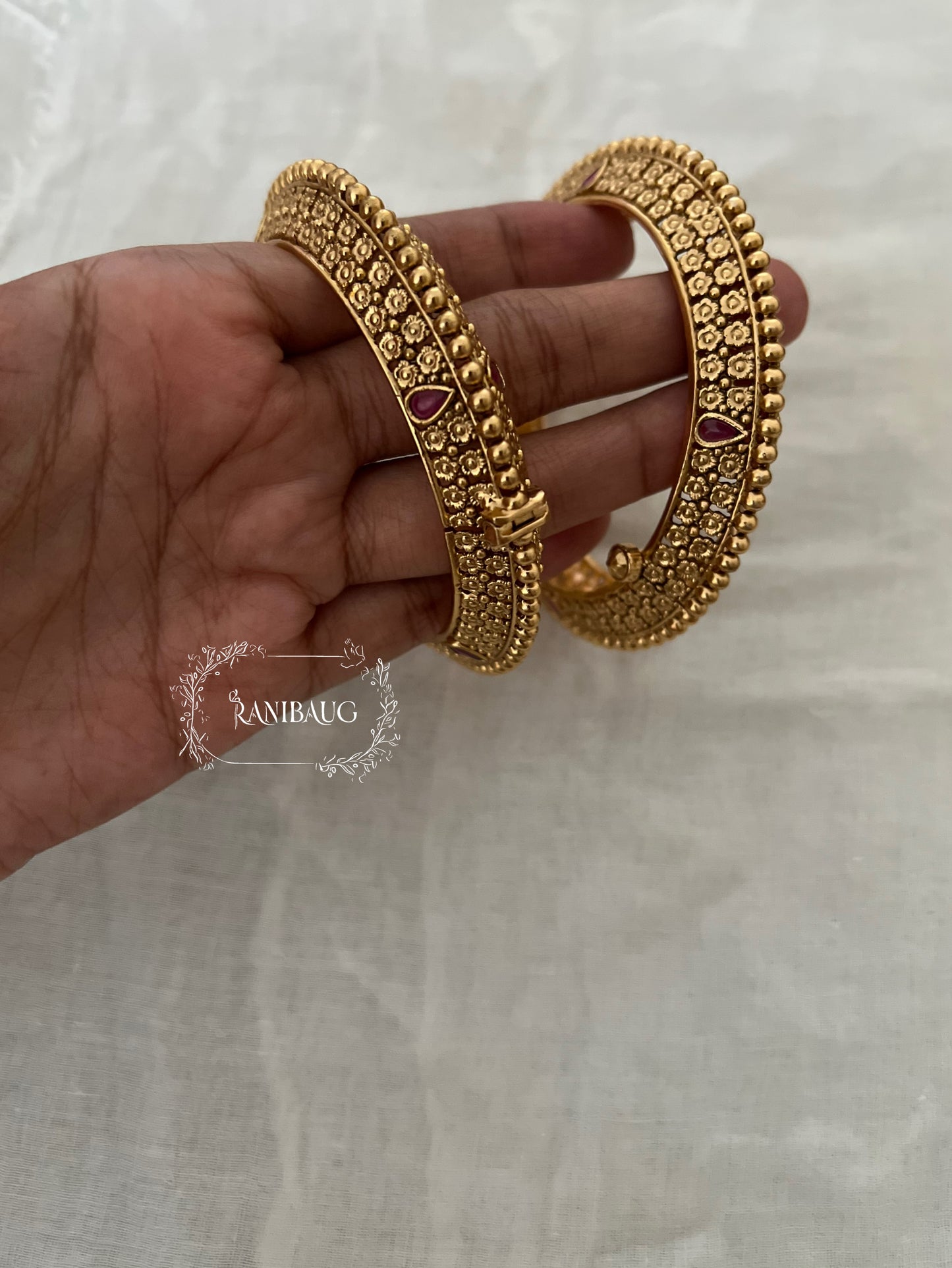 Vriti Floral Intricate Motif Gold Finish Heritage Bangle Pair By Ranibaug