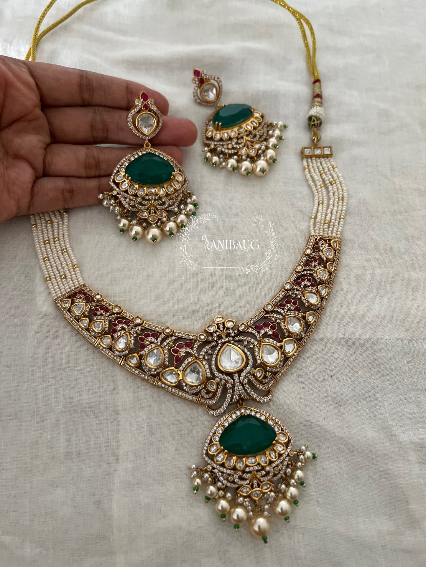 Vrushita Rich Gold Finish Polki Kundan Studded Pearl Adorned Royal Jewellery Set By Ranibaug