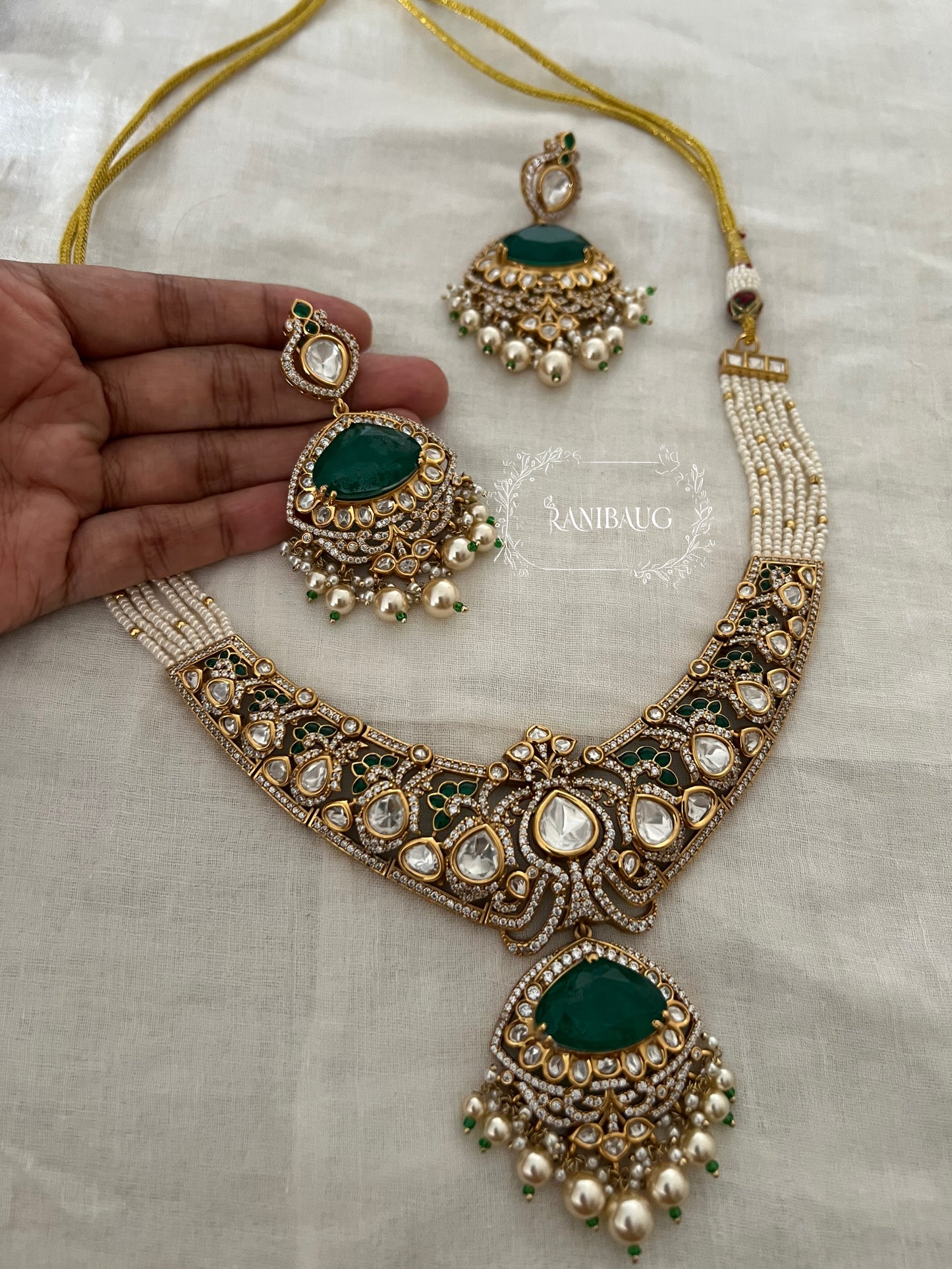 Vrushita Rich Gold Finish Polki Kundan Studded Pearl Adorned Royal Jewellery Set By Ranibaug