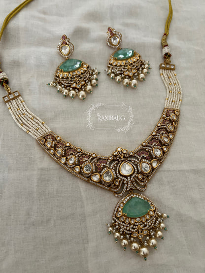 Vrushita Rich Gold Finish Polki Kundan Studded Pearl Adorned Royal Jewellery Set By Ranibaug