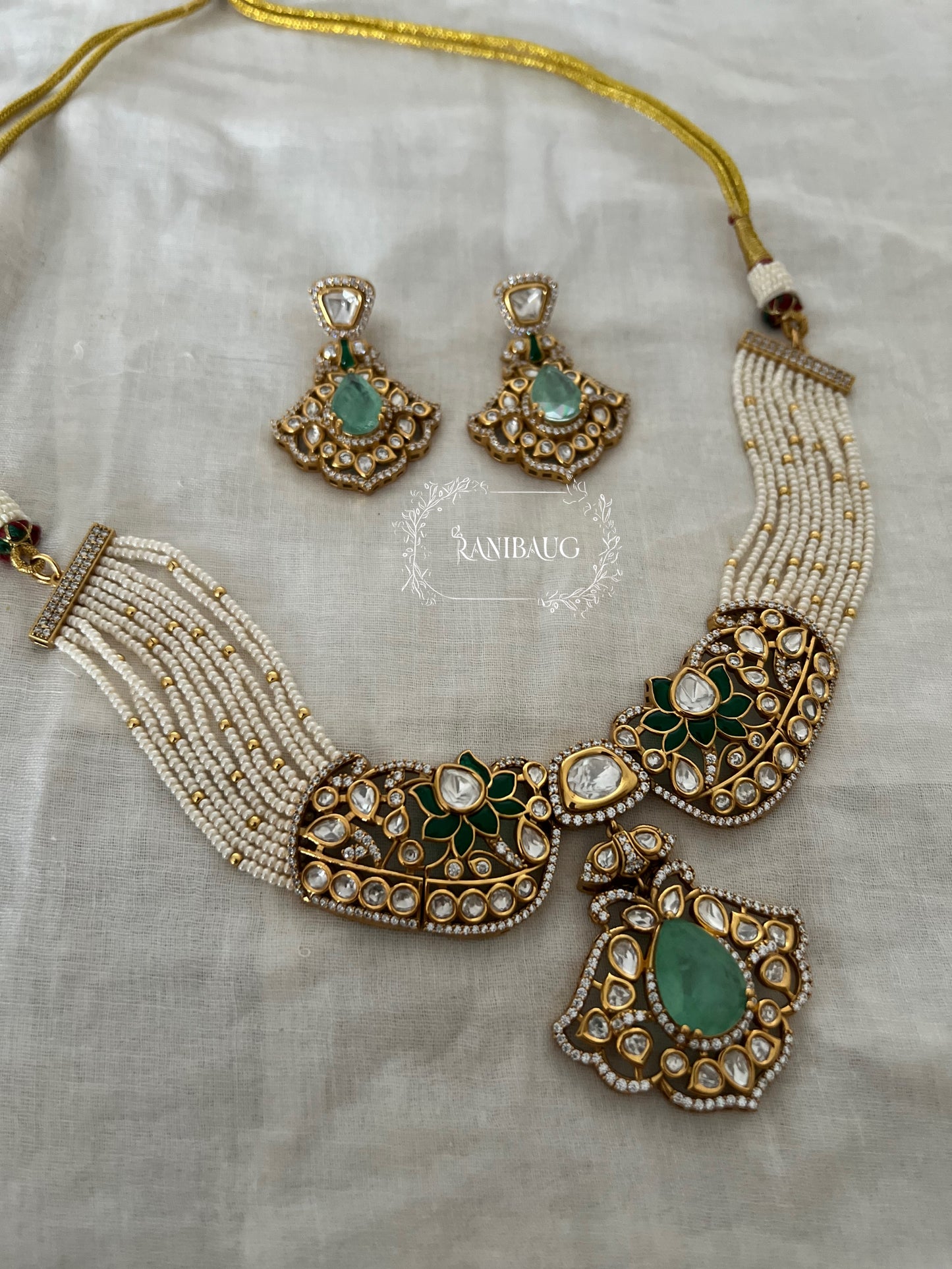 Vrutti Polki Studded Gold Finish Enamel Floral Pearl Strand Choker Necklace Set By Ranibaug