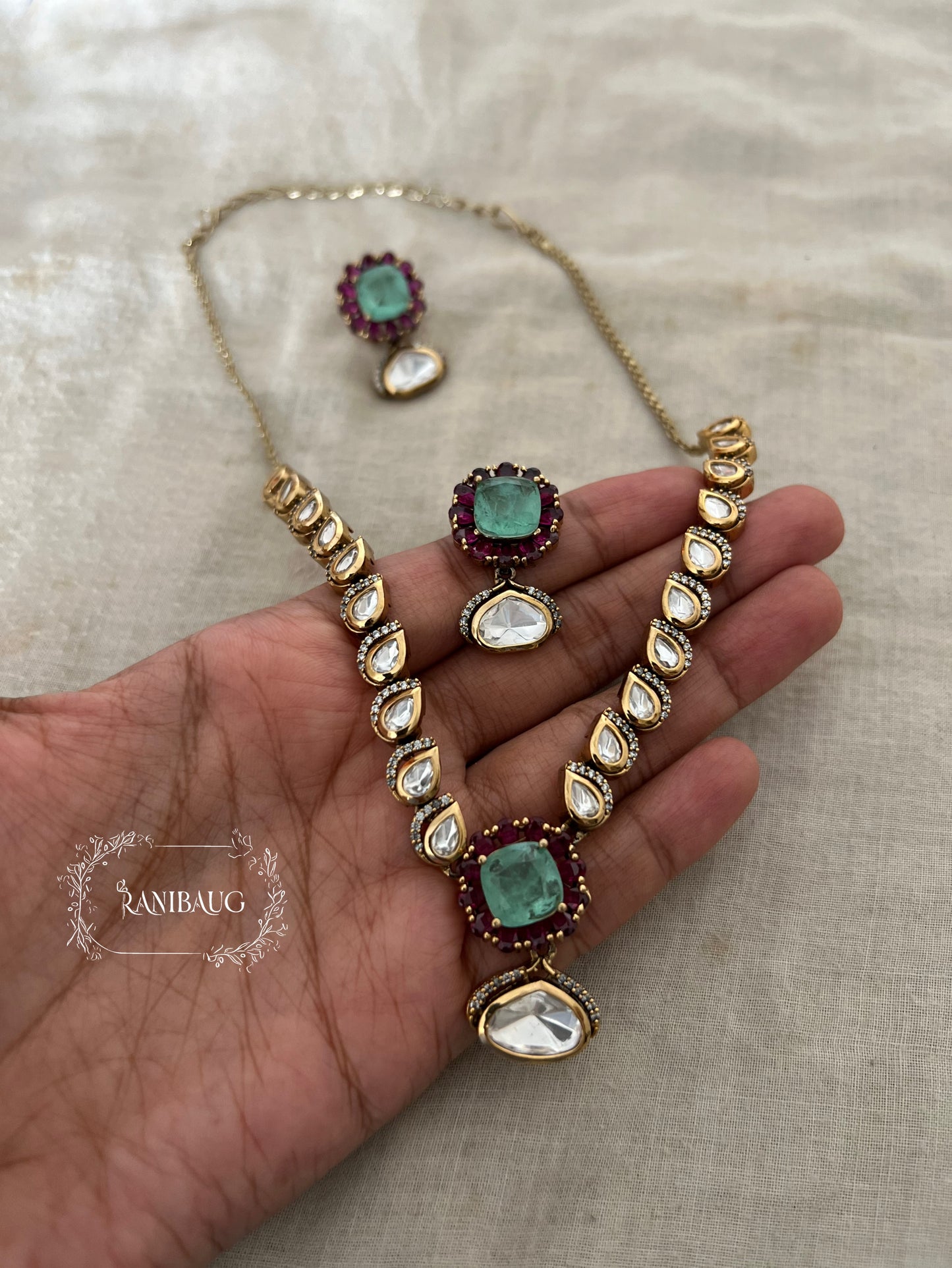 Vrutti Polki Studded Mint Gemstone Gold Finish Necklace Jewellery Set By Ranibaug
