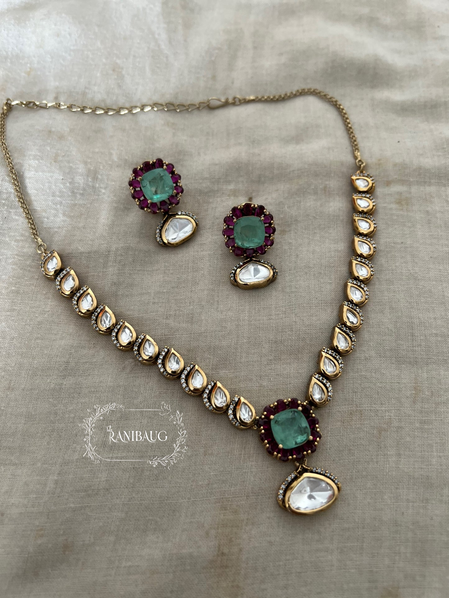 Vrutti Polki Studded Mint Gemstone Gold Finish Necklace Jewellery Set By Ranibaug