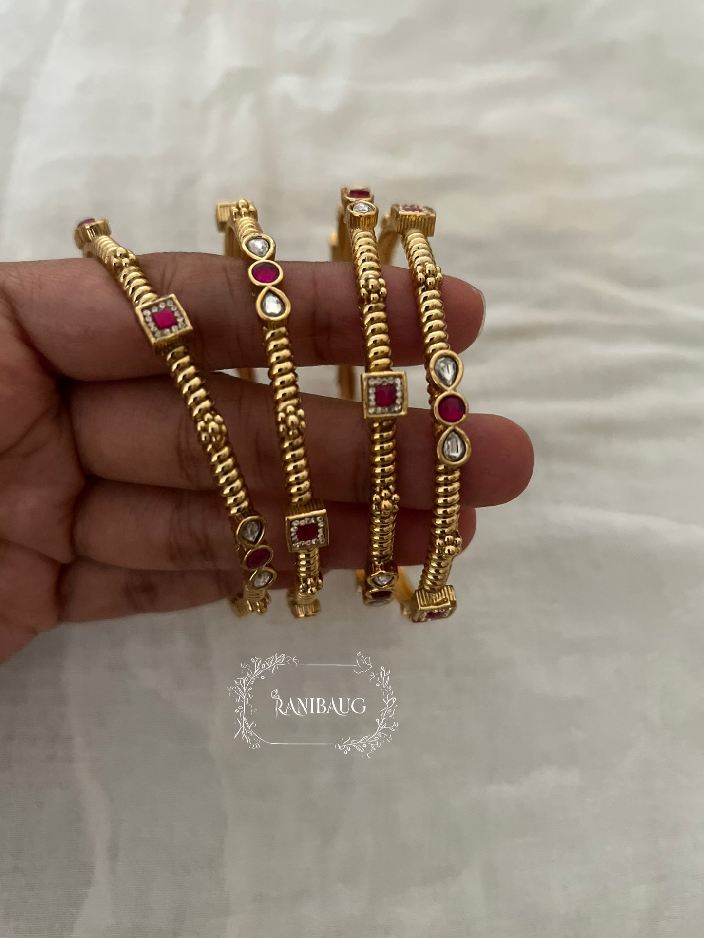 Yamika Ruby Polki Designer Classic Gold Bangles Set By Ranibaug