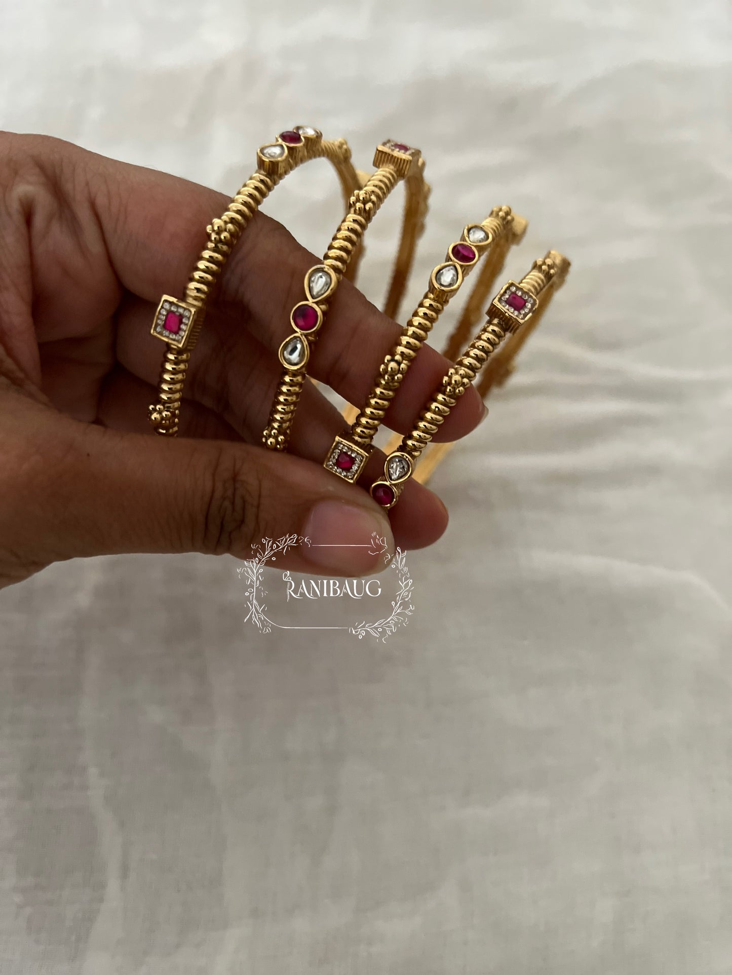 Yamika Ruby Polki Designer Classic Gold Bangles Set By Ranibaug