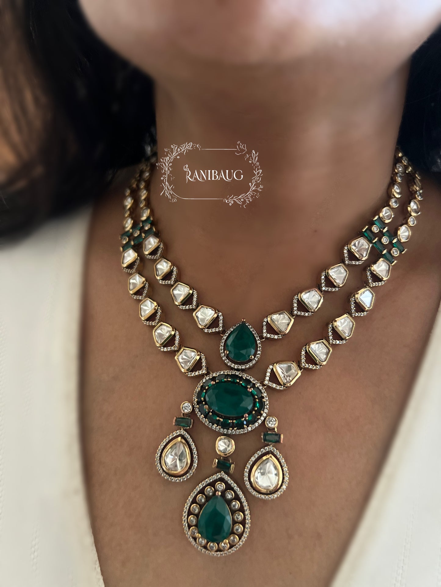 Zarika Geometric Polki Studded Gold Finish Emerald Stones Adorned Two Layered Necklace Set By Ranibaug