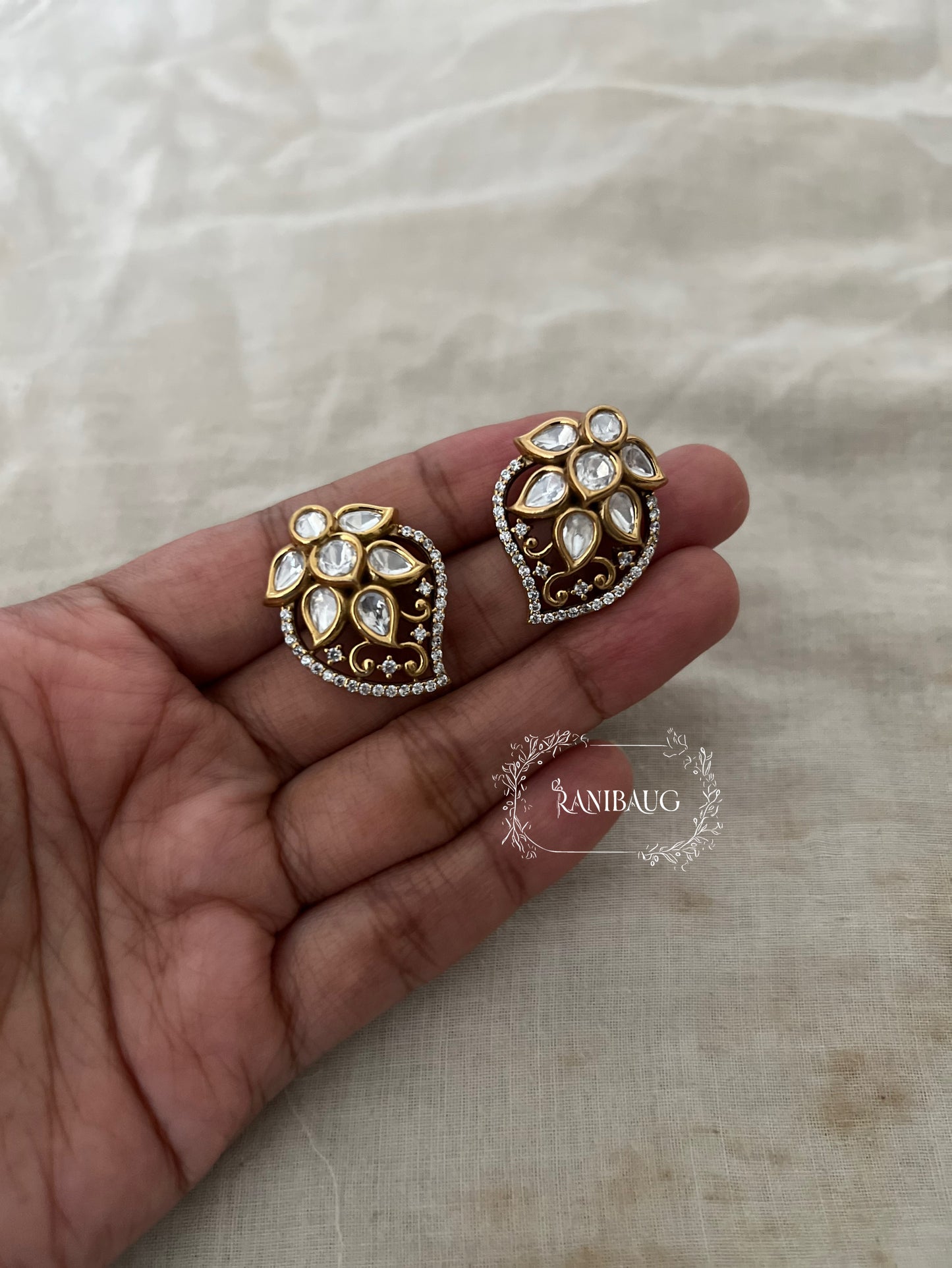 Ziva Stylish Antique Gold Leaf Kundan Floral Motif Ear Studs By Ranibaug